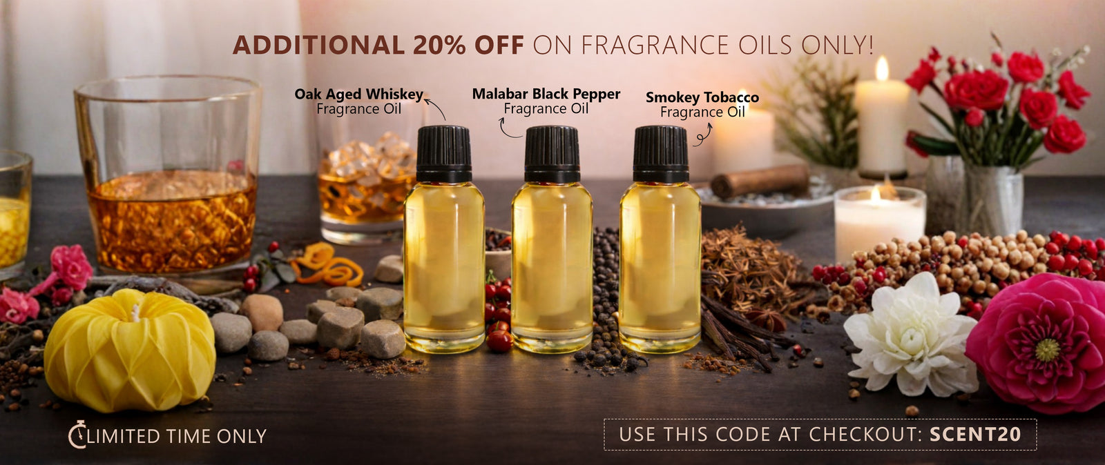 Fragrance oils with a promotional message on a wooden surface with candles and flowers.